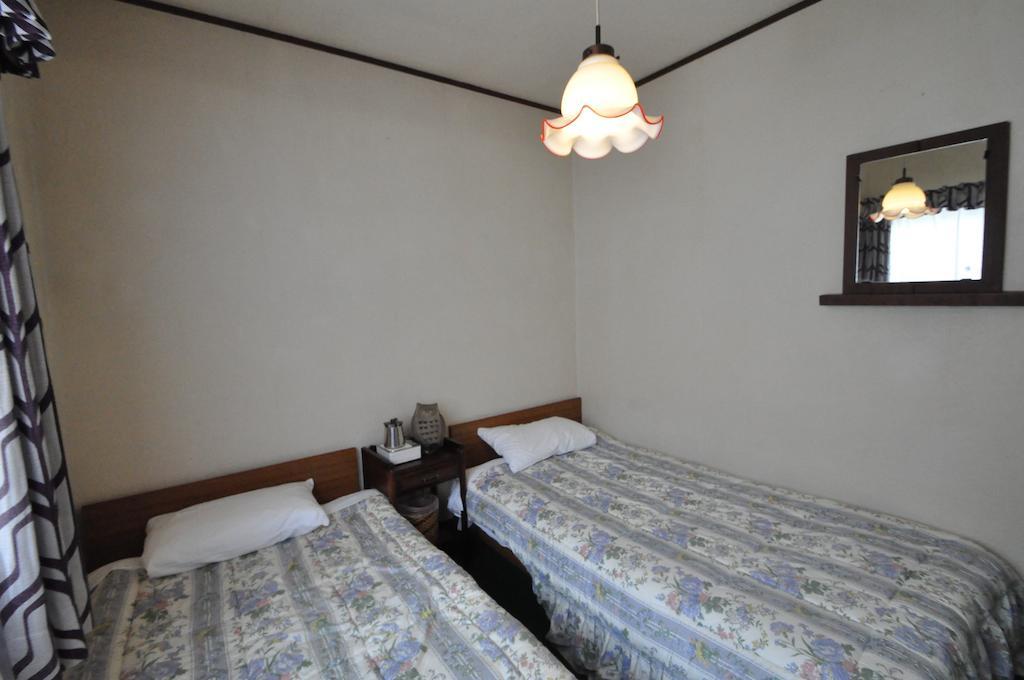 Guest House Wind Inn Хакуба Номер фото